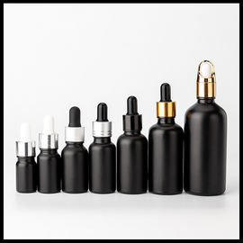 चीन काले पाले सेओढ़ लिया रंग आवश्यक तेल कांच की बोतलें कॉस्मेटिक पैकेजिंग गोल आकार आपूर्तिकर्ता
